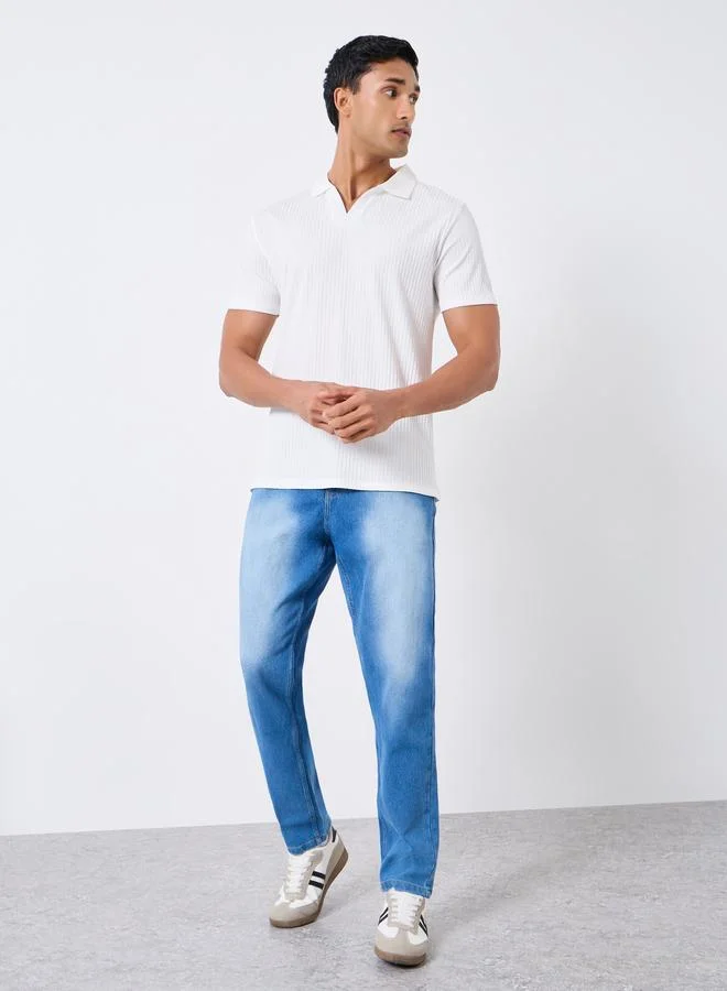 Men Washed Tapered Fit Faded Jeans